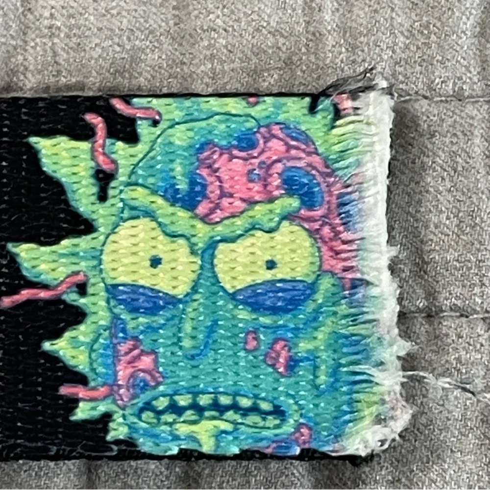 RICK AND MORTY Cell Faces Cinch Belt by Buckle Down Bottle Opener Black Web Men